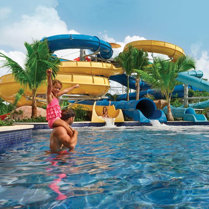 Pool and slide at a Hilton All-Inclusive resort